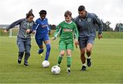 5 October 2015; Pictured are Republic of Ireland players Aine O’Gorman and Jonathan Walters with Temilade Fteuga, age 11, and Tadhg Curran, age 11, from St. Bernadette's Junior School, Clondalkin, Co. Dublin. The Republic of Ireland players made a surprise appearance at an exclusive SPAR training session at the National Sports Campus in advance of the Republic of Ireland vs Germany game on Thursday. SPAR is the Official Convenience Retail Partner of the FAI. FAI National Training Centre, National Sports Campus, Abbotstown, Dublin. Picture credit: David Maher / SPORTSFILE