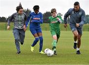 5 October 2015; Pictured are Republic of Ireland players  Aine O’Gorman and Jonathan Walters with Temilade Fteuga, age 11, and Tadhg Curran, age 11,  from St. Bernadette's Junior School, Clondalkin, Co. Dublin. The Republic of Ireland players made a surprise appearance at an exclusive SPAR training session at the National Sports Campus in advance of the Republic of Ireland vs Germany game on Thursday. SPAR is the Official Convenience Retail Partner of the FAI. FAI National Training Centre, National Sports Campus, Abbotstown, Dublin. Picture credit: David Maher / SPORTSFILE