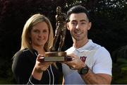 8 October 2015; Richie Towell, Dundalk FC, is presented with his SSE Airtricity/SWAI Player of the Month Award for September 2015 by Leanne Sheill from Airtricity. Merrion Square, Dublin 2. Picture credit: Ray McManus / SPORTSFILE