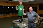 8 October 2015; Rian McEntaggart, age 7, from Dunshaughlin, Co. Meath, pictured with equipment manager Dick Redmond in the Republic of Ireland dressing room after a job well done, was the lucky little footie fan that won a 3Plus VIP experience to get him behind-the-scenes on match day. Three, proud sponsor of the Irish football team. Aviva Stadium, Lansdowne Road, Dublin. Picture credit: Cody Glenn / SPORTSFILE