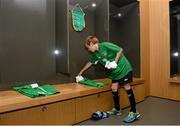 8 October 2015; Rian McEntaggart, age 7, from Dunshaughlin, Co. Meath, pictured laying out the socks for his favourite player Robbie Keane in the Republic of Ireland dressing room, was the lucky little footie fan that won a 3Plus VIP experience to get him behind-the-scenes on match day. Three, proud sponsor of the Irish football team. Aviva Stadium, Lansdowne Road, Dublin. Picture credit: Cody Glenn / SPORTSFILE