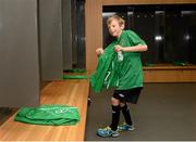 8 October 2015; Rian McEntaggart, age 7, from Dunshaughlin, Co. Meath, pictured setting up player jerseys and shorts in the Republic of Ireland dressing room, was the lucky little footie fan that won a 3Plus VIP experience to get him behind-the-scenes on match day. Three, proud sponsor of the Irish football team. Aviva Stadium, Lansdowne Road, Dublin. Picture credit: Cody Glenn / SPORTSFILE