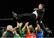 8 October 2015; Northern Ireland manager Michael O'Neill gets thrown in the air by his players during the celebrations after the game. UEFA EURO 2016 Championship Qualifier, Group F, Northern Ireland v Greece. Windsor Park, Belfast. Picture credit: Oliver McVeigh / SPORTSFILE