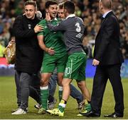 8 October 2015; Shane Long, Republic of Ireland, celebrates with Kevin Doyle and Robbie Keane after the game. UEFA EURO 2016 Championship Qualifier, Group D, Republic of Ireland v Germany. Aviva Stadium, Lansdowne Road, Dublin. Picture credit: David Maher / SPORTSFILE