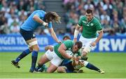 4 October 2015; Jack McGrath, Ireland, is tackled by Josh Furno, left, and Tommaso Benvenuti, Italy. 2015 Rugby World Cup, Pool D, Ireland v Italy. Olympic Stadium, Stratford, London, England. Picture credit: Stephen McCarthy / SPORTSFILE