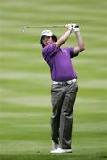 23 May 2009;  Rory McIlroy of Northern Ireland plays an approach shot during round 3 of the BMW PGA Championship at Wentworth Golf Course. Virginia Water, England. Picture credit: Tim Hales / SPORTSFILE