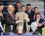 23 May 2009; Winning connections including Aidan O'Brien, trainer, Johnny Murtagh, jockey and Derrick Smith, owner, are presented with the trophies by John Boyle, Managing Director of Boylesports after Mastercraftsman won the Boylesports.com Irish 2,000 Guineas. Boylesports.com Irish Guineas Festival 2009, Curragh Racecourse, Co. Kildare. Picture credit: Pat Murphy / SPORTSFILE