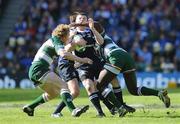 23 May 2009; Brian O'Driscoll, Leinster, is tackled by Ayoola Erinle and Sam Vesty, left, Leicester Tigers. Heineken Cup Final, Leinster v Leicester Tigers, Murrayfield Stadium, Edinburgh, Scotland. Picture credit: Brendan Moran / SPORTSFILE