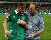 8 October 2015; Republic of Ireland manager Martin O'Neill with James McCarthy at the end of the game. UEFA EURO 2016 Championship Qualifier, Group D, Republic of Ireland v Germany. Aviva Stadium, Lansdowne Road, Dublin. Picture credit: David Maher / SPORTSFILE
