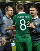 8 October 2015; Republic of Ireland manager Martin O'Neill with Robbie Keane and James McCarthy at the end of the game. UEFA EURO 2016 Championship Qualifier, Group D, Republic of Ireland v Germany. Aviva Stadium, Lansdowne Road, Dublin. Picture credit: David Maher / SPORTSFILE