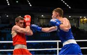 9 October 2015; Sean McComb, right, Ireland, exchanges punches with Albert Selimov, Azerbaijan, during their Men's Lightweight 60kg last 16 bout. AIBA World Boxing Championships, Ali Bin Hamad Al Attiyah Arena, Doha, Qatar. Photo by Sportsfile