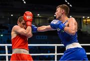9 October 2015; Sean McComb, right, Ireland, exchanges punches with Albert Selimov, Azerbaijan, during their Men's Lightweight 60kg last 16 bout. AIBA World Boxing Championships, Ali Bin Hamad Al Attiyah Arena, Doha, Qatar. Photo by Sportsfile