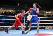 9 October 2015; Albert Selimov, left, Azerbaijan, exchanges punches with Sean McComb, left, Ireland, during their Men's Lightweight 60kg last 16 bout. AIBA World Boxing Championships, Ali Bin Hamad Al Attiyah Arena, Doha, Qatar. Photo by Sportsfile