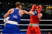 9 October 2015; Sean McComb, left, Ireland, exchanges punches with Albert Selimov, Azerbaijan, during their Men's Lightweight 60kg last 16 bout. AIBA World Boxing Championships, Ali Bin Hamad Al Attiyah Arena, Doha, Qatar. Photo by Sportsfile