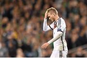 8 October 2015; André Schürrle, Germany, reacts following his side's defeat. UEFA EURO 2016 Championship Qualifier, Group D, Republic of Ireland v Germany. Aviva Stadium, Lansdowne Road, Dublin. Picture credit: Ramsey Cardy / SPORTSFILE