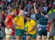 10 October 2015; Will Genia, Australia, is yellow carded by referee Craig Joubert. 2015 Rugby World Cup, Pool A, Australia v Wales. Twickenham Stadium, London, England. Picture credit: Matt Browne / SPORTSFILE