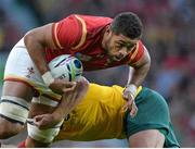 10 October 2015; Taulupe Faletau, Wales, is tackled by Stephen Moore, Australia. 2015 Rugby World Cup, Pool A, Australia v Wales. Twickenham Stadium, London, England. Picture credit: Matt Browne / SPORTSFILE