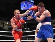 10 October 2015; Mikhail Baudhaliavets, left, Belarus, exchanges punches with Joseph Ward, Ireland, during their Men's Light Heavyweight 81kg Quarter-Final bout. AIBA World Boxing Championships, Quarter-Finals, Ali Bin Hamad Al Attiyah Arena, Doha, Qatar. Photo by Sportsfile