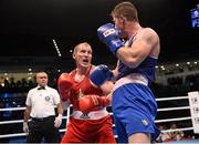 10 October 2015; Mikhail Baudhaliavets, left, Belarus, exchanges punches with Joseph Ward, Ireland, during their Men's Light Heavyweight 81kg Quarter-Final bout. AIBA World Boxing Championships, Quarter-Finals, Ali Bin Hamad Al Attiyah Arena, Doha, Qatar. Photo by Sportsfile