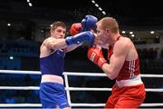 10 October 2015; Joseph Ward, left, Ireland, exchanges punches with Mikhail Baudhaliavets, Belarus, during their Men's Light Heavyweight 81kg Quarter-Final bout. AIBA World Boxing Championships, Quarter-Finals, Ali Bin Hamad Al Attiyah Arena, Doha, Qatar. Photo by Sportsfile