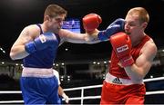 10 October 2015; Joseph Ward, left, Ireland, exchanges punches with Mikhail Baudhaliavets, Belarus, during their Men's Light Heavyweight 81kg Quarter-Final bout. AIBA World Boxing Championships, Quarter-Finals, Ali Bin Hamad Al Attiyah Arena, Doha, Qatar. Photo by Sportsfile