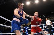 10 October 2015; Mikhail Baudhaliavets, right, Belarus, exchanges punches with Joseph Ward, Ireland, during their Men's Light Heavyweight 81kg Quarter-Final bout. AIBA World Boxing Championships, Quarter-Finals, Ali Bin Hamad Al Attiyah Arena, Doha, Qatar. Photo by Sportsfile