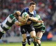 23 May 2009; Brian O'Driscoll, Leinster, is tackled by Tom Croft, left, and Ben Woods, Leicester Tigers. Heineken Cup Final, Leinster v Leicester Tigers, Murrayfield Stadium, Edinburgh, Scotland. Picture credit: Ray McManus / SPORTSFILE