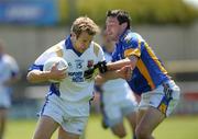 24 May 2009; Brian Kavanagh, Longford, in action against Ciaran Hyland, Wicklow. Leinster GAA Football Senior Championship, First Round, Longford v Wicklow, O'Moore Park, Portlaoise, Co. Laois. Photo by Sportsfile
