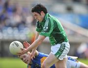 24 May 2009; Ger Collins, Limerick, in action against Conor Morrissey, Tipperary. Munster GAA Football Senior Championship Quarter-Final, Tipperary v Limerick, Semple Stadium, Thurles. Picture credit: David Maher / SPORTSFILE