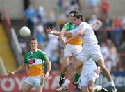 24 May 2009; Mikey Conway, Kildare, in action against John Reynolds, Offaly. Leinster GAA Football Senior Championship, First Round, Kildare v Offaly, O'Moore Park, Portlaoise, Co. Laois. Photo by Sportsfile