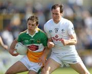 24 May 2009; William Mulhall, Offaly, in action against, Michael Foley, Kildare. Leinster GAA Football Senior Championship, First Round, Kildare v Offaly, O'Moore Park, Portlaoise, Co. Laois. Photo by Sportsfile