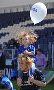 24 May 2009; Mimi Leonard, age 2, from Leopardstown, dances to the music with her mum Deirdre while awaiting the Leinster rugby squad'sarrival at the homecoming after their victory in the Heineken Cup Final. RDS, Ballsbridge, Dublin. Picture credit: Brendan Moran / SPORTSFILE