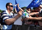 24 May 2009; Leinster head coach Michael Cheika signs autographs during their homecoming after their victory in the Heineken Cup Final. RDS, Ballsbridge, Dublin. Picture credit: Brendan Moran / SPORTSFILE