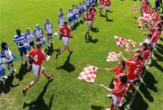 24 May 2009; Cork players make their way onto the pitch for the start of the game against Waterford. Munster GAA Football Senior Championship Quarter-Final, Cork v Waterford, Fraher Field, Dungarvan, Co. Waterford. Picture credit: Matt Browne / SPORTSFILE