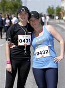 24 May 2009; News of the World reporter Emma McMenamy, from Lucan, Co. Dublin, and Lorna Cummins, from Celbridge, Co. Kildare, before the start of the Adamstown 8k Road Race. Adamstown, Lucan, Co. Dublin. Picture credit: Tomas Greally / SPORTSFILE