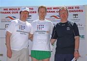24 May 2009; Mark Kirwan, Raheny Shamrocks A.C, centre, who finished second, with Jude Byrne, Adamstown Community Partnership, left, and Tony McGinley, Principal of the St. John The Evangelist school, Adamstown, after the Adamstown 8k Road Race. Adamstown, Lucan, Co. Dublin. Picture credit: Tomas Greally / SPORTSFILE