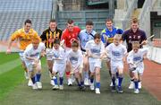 25 May 2009; Children from the Holy Trinity School, Donaghmede, are left to right, Ryan Murphy, Jamie Loftus, Brandon Kane, Graham O'Reilly, Earnest Lemantovic and Kameron Walsh, with players, from left to right, Aaron Graffin, Antrim, Paul Murphy, Kilkenny, Patrick Horgan, Cork, Liam Rushe, Dublin, Seamus Callinan, Tipperary, and Joe Canning, Galway, at the of the launch of the Bord Gais Energy U21 Hurling Championship. Croke Park, Dublin. Picture credit: David Maher / SPORTSFILE