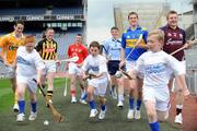 25 May 2009; Children from the Holy Trinity School, Donaghmede, are left to right, Ryan Murphy, Graham O'Reilly and Earnest Lemantovic with players, left to right, Aaron Graffin, Antrim, Paul Murphy, Kilkenny, Patrick Horgan, Cork, Liam Rushe, Dublin, Seamus Callinan, Tipperary, and Joe Canning, Galway, at the of the launch of the Bord Gais Energy U21 Hurling Championship. Croke Park, Dublin. Picture credit: David Maher / SPORTSFILE