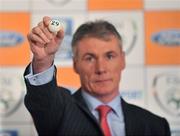 25 May 2009; Former Republic of Ireland International Frank Stapleton draws the ball number 29, Tralee Dynamos, at the FAI Ford Cup third round draw. Burlington Hotel, Ballsbridge, Dublin. Picture credit: David Maher / SPORTSFILE *** Local Caption ***