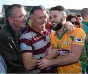 11 October 2015; Cathal Silke, Corofin, celebrates with friends and family at the final whistle. Galway County Senior Football Championship Final, Mountbellew/Moylough v Corofin. Tuam Stadium, Tuam, Co. Galway. Picture credit: Sam Barnes / SPORTSFILE