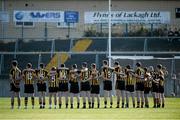 11 October 2015; The Mountbellew/Moylough team face the Tricolour during the National Anthem. Galway County Senior Football Championship Final, Mountbellew/Moylough v Corofin. Tuam Stadium, Tuam, Co. Galway. Picture credit: Sam Barnes / SPORTSFILE
