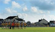 11 October 2015; The Corofin team face the Tricolour during the National Anthem. Galway County Senior Football Championship Final, Mountbellew/Moylough v Corofin. Tuam Stadium, Tuam, Co. Galway. Picture credit: Sam Barnes / SPORTSFILE