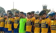 11 October 2015; Sixmilebridge players stand for the National Anthem before the game. Clare County Senior Hurling Championship Final, Clonlara v Sixmilebridge. Cusack Park, Ennis, Co. Clare. Picture credit: Piaras Ó Mídheach / SPORTSFILE