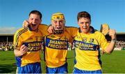 11 October 2015; Sixmilebridge players, from left, Conor Deasy, Barry Fitzpatrick and Brian Corry celebrate after the game. Clare County Senior Hurling Championship Final, Clonlara v Sixmilebridge. Cusack Park, Ennis, Co. Clare. Picture credit: Piaras Ó Mídheach / SPORTSFILE