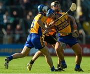 11 October 2015; Caimin Morey, Sixmilebridge, supported by team-mate Aidan Quilligan, left, in action against Michéal O'Loughlin, Clonlara. Clare County Senior Hurling Championship Final, Clonlara v Sixmilebridge. Cusack Park, Ennis, Co. Clare. Picture credit: Piaras Ó Mídheach / SPORTSFILE