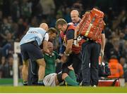 11 October 2015; Paul O'Connell, Ireland, sits back down on the pitch helped by Dr Eanna Falvey before being stretchered from the pitch after picking up an injury. 2015 Rugby World Cup Pool D, Ireland v France. Millennium Stadium, Cardiff, Wales. Picture credit: Matt Browne / SPORTSFILE