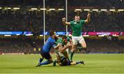 11 October 2015; Rob Kearney, Ireland, goes over to score his side's first try despite the tackle of Brice Dulin and Frederic Michalak, France. 2015 Rugby World Cup Pool D, Ireland v France. Millennium Stadium, Cardiff, Wales. Picture credit: Stephen McCarthy / SPORTSFILE