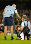 11 October 2015; Jonathan Sexton, Ireland, with Ireland physiotherapist James Allen, right, and Dr Eanna Falvey, Ireland team doctor, before he left the pitch after picking up an injury. 2015 Rugby World Cup Pool D, Ireland v France. Millennium Stadium, Cardiff, Wales. Picture credit: Brendan Moran / SPORTSFILE