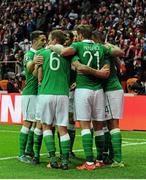 11 October 2015; Jon Walters, Republic of Ireland celebrates with team-mates after scoring his side's opening goal. UEFA EURO 2016 Championship Qualifier, Group D, Poland v Republic of Ireland. Stadion Narodowy, Warsaw, Poland. Picture credit: Seb Daly / SPORTSFILE