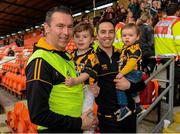 11 October 2015; Oisin McConville, Crossmaglen Rangers joint manager and his three year old son Ryan McConville, with Aaron Kernan and his 18 month son James Kernan. Armagh County Senior Football Championship Final, Crossmaglen Rangers v Armagh Harps. Athletic Grounds, Armagh. Picture credit: Oliver McVeigh / SPORTSFILE